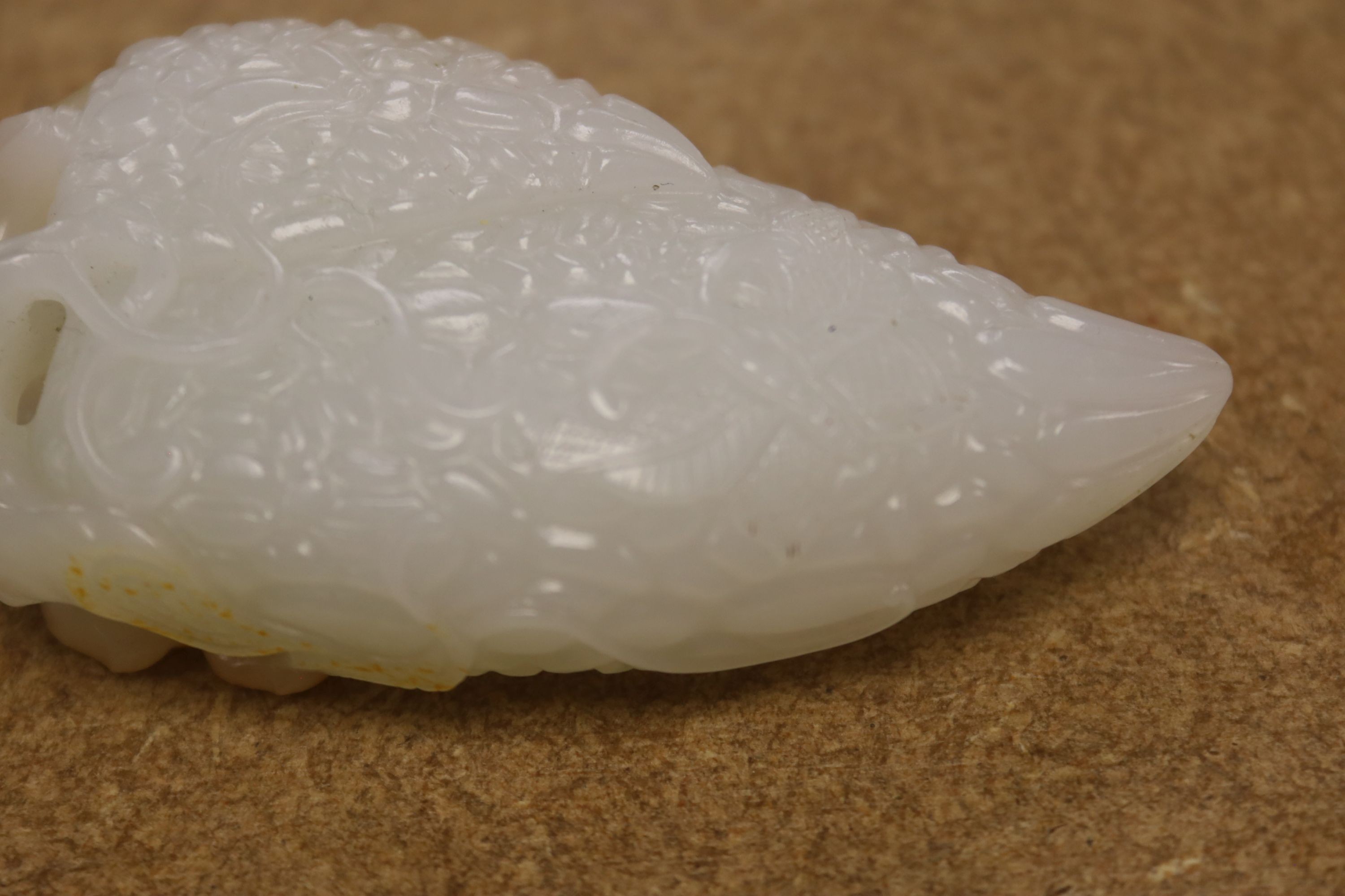 A Chinese white and russet skin jade carving, 7cm high